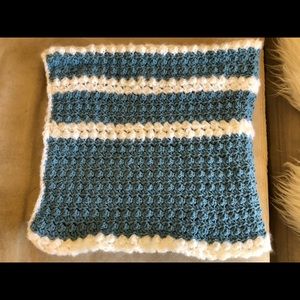 Handmade by me.  Crochet baby blanket